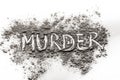Word Murder written in ash Royalty Free Stock Photo