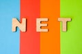 Word NET composed of 3D letters is in background of 4 colors: blue, red, orange and green. Domain designation or framework, short