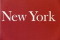 Word `New York` written on red book