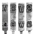 Word NEWS in Old Typewriter Typebar Letters Isolated on White Royalty Free Stock Photo