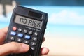 Word No risk on napkin and calculator on wooden tble . Finance concept Royalty Free Stock Photo