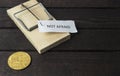The word: Not afraid pinned on mouse trap with backside of bitcoin. Royalty Free Stock Photo
