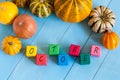 Word October On child's toy cubes and pumpkins on