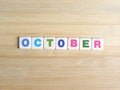 Word October on wood background Royalty Free Stock Photo