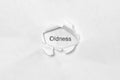 Word Oldness on white isolated background through the wound hole in the paper. Royalty Free Stock Photo