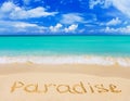 Word Paradise on beach Royalty Free Stock Photo