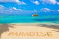 Word Paradise on beach Royalty Free Stock Photo