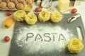 The word pasta is written on the flour with your finger Royalty Free Stock Photo