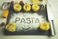 The word pasta is written on the flour with your finger Royalty Free Stock Photo