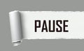 the word PAUSE as a symbol is written