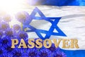 Word Pesach made of Matzoh traditional Jewish bread for Passover holiday against Israel National flag