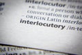Word or phrase Interlocutory in a dictionary Royalty Free Stock Photo