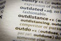 Word or phrase Outdistance in a dictionary Royalty Free Stock Photo