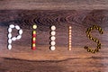 Word `pill` built with tablets Royalty Free Stock Photo
