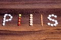 Word `pill` built with tablets Royalty Free Stock Photo