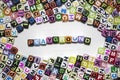 The word PLAYGROUND written on wooden cubes isolated on a black background Royalty Free Stock Photo