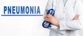 Word - Pneumonia on a white background. Medical concept