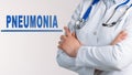 Word - Pneumonia on a white background. Medical concept