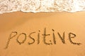 Word positive draw on beach Royalty Free Stock Photo