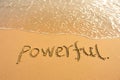 Word powerful draw on beach Royalty Free Stock Photo