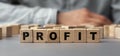 The word profit made from wooden cubes. Selective focus Royalty Free Stock Photo