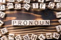 word pronoun composed of wooden cubes with letters Royalty Free Stock Photo