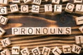 word pronouns composed of wooden cubes with letters Royalty Free Stock Photo