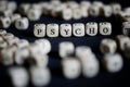 The word psycho made up of many letter cubes on a dark surface. Psychology, psychoanalysis, psychotherapy and mental disorders Royalty Free Stock Photo