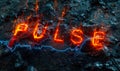 The word PULSE glowing in fiery red on a dark, textured surface with blue electrocardiogram waves, illustrating the concept