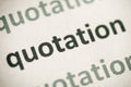 Word quotation printed on paper macro Royalty Free Stock Photo