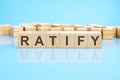 word ratify made with wood building blocks, business concept