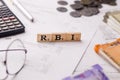 Word RBI written on wooden cubes stock image.