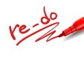 The word re-do with a red marker Royalty Free Stock Photo