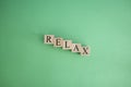 The word relax made from wooden cubes. Rest and calm concept Royalty Free Stock Photo