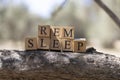 The word rem sleep was created from wooden cubes. Royalty Free Stock Photo