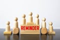 word REMINDER on wooden block, business concept Royalty Free Stock Photo
