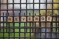 The word revenge from wooden letters