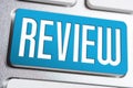 The Word Review On A Blue Keyboard Button Royalty Free Stock Photo