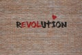 Word Revolution as graffiti on brick wall Royalty Free Stock Photo