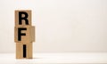 word RFI Abbreviation of request for information on wood background