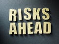 The word Risks Ahead on paper background Royalty Free Stock Photo
