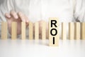 Word ROI Return on Investment made with wood building blocks Royalty Free Stock Photo