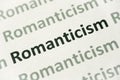 Word Romanticism printed on paper macro Royalty Free Stock Photo