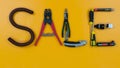 The word SALE made up of letters collected from professional electrician tools. Royalty Free Stock Photo