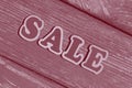 Word sale made of wooden letters on board Royalty Free Stock Photo