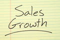 Sales Growth On A Yellow Legal Pad Royalty Free Stock Photo
