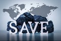 Word SAVE and coal stack on map of world backgrpound Royalty Free Stock Photo
