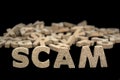 Word scam in cork letters Royalty Free Stock Photo