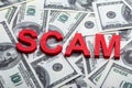 Word Scam On Hundred Dollar Bills Royalty Free Stock Photo