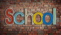 The Word School on a Brick Wall Background